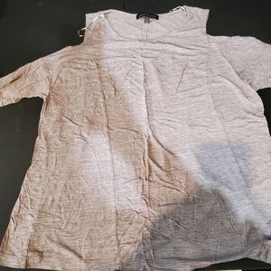 Pink long sleeved knit top with peeping shoulders